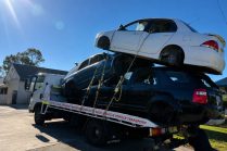 Tow Truck Carrying Stacked Cars